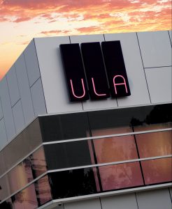 ULA Illuminated LED Building Sign at Sunset
